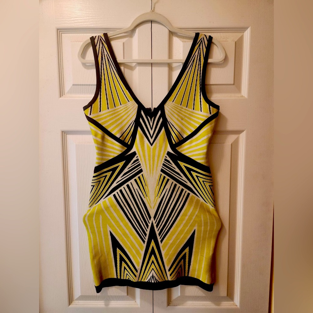 Herve Leger, lime green, white, and black bandage dress.